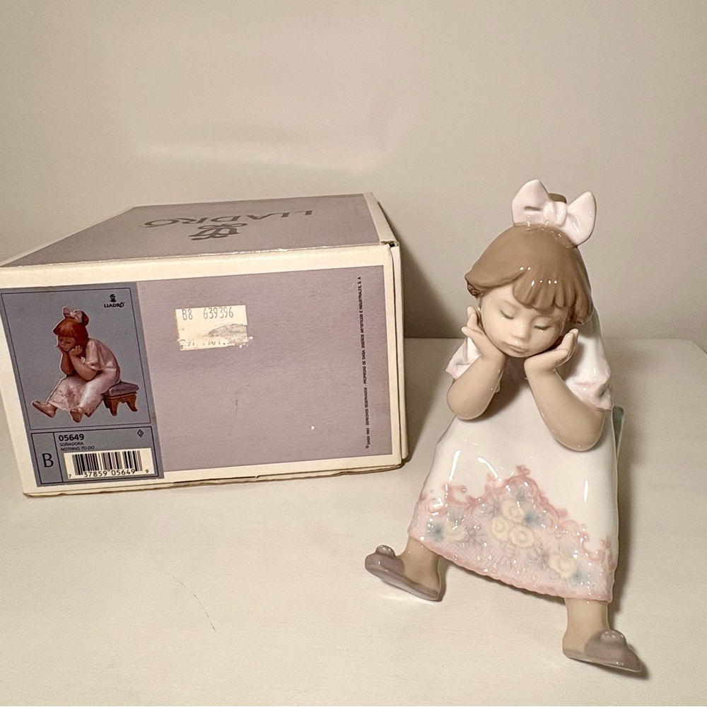 Lladro Porcelain Figurine  “Nothing to Do” - White and Pink Accents Little girl